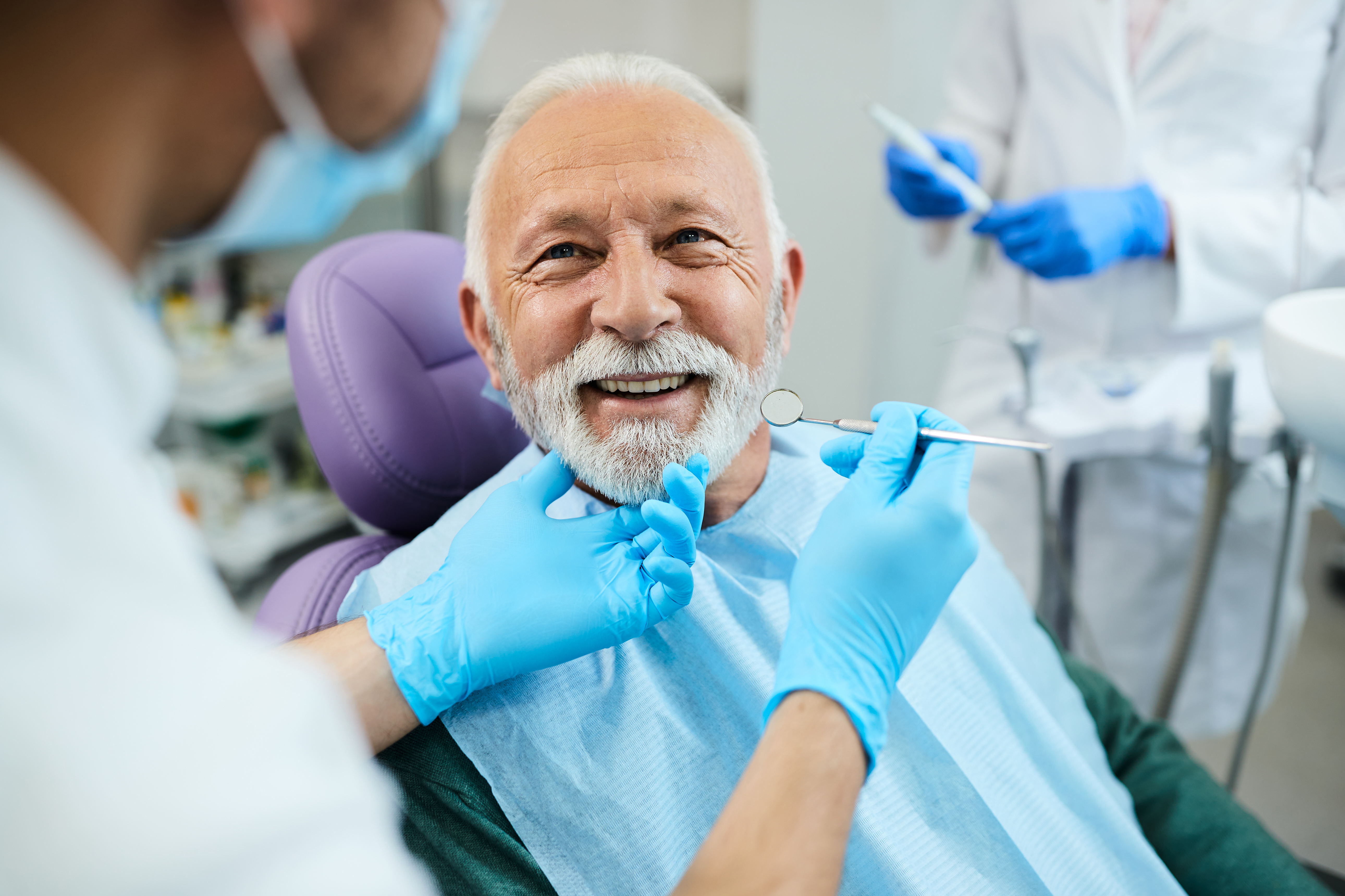 Happy patient at dental clinic